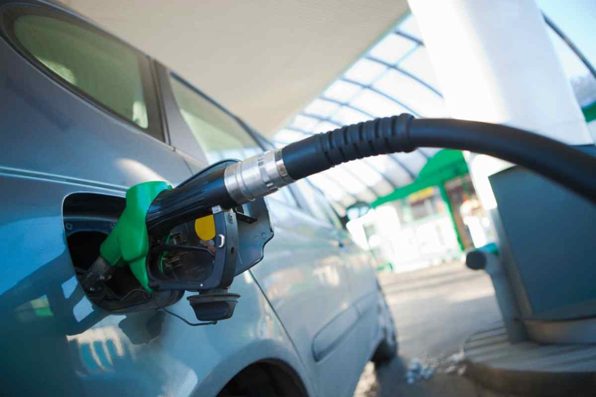 Car fueling up at a gas station