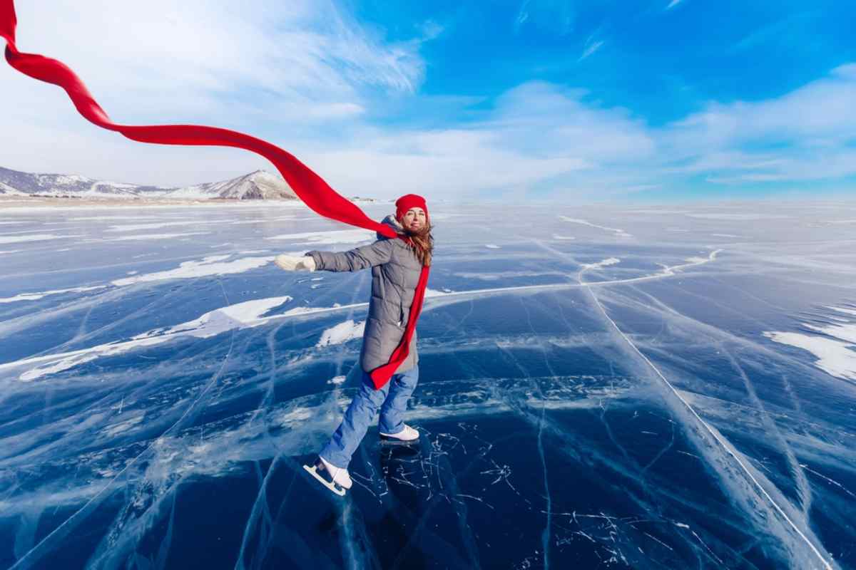 woman enjoying the wintry weather of October in Iceland
