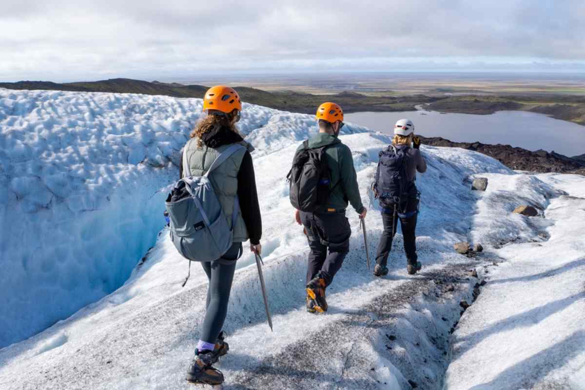 Group of tourist hiking a glacier in Iceland
