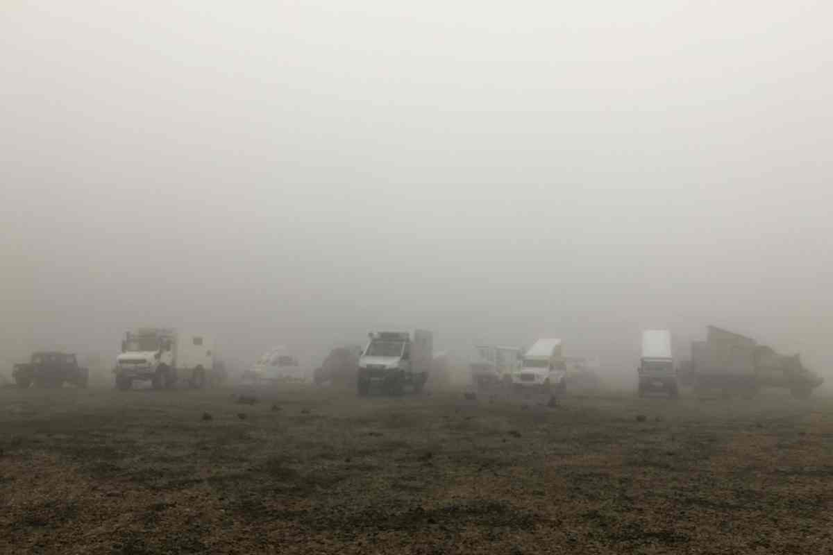 Superjeep vehicles on a misty day in Iceland